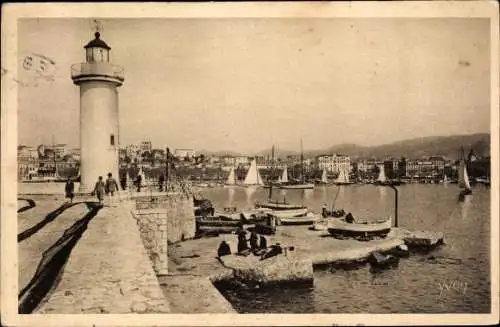 Ak Cannes Alpes Maritimes, La Jetee et le Phare, Leuchtturm