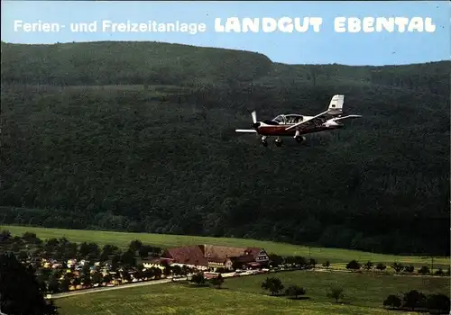 Ak Rüdesheim am Rhein, Ferien- und Freizeitanlage Landgut Ebental, Sportflugzeug