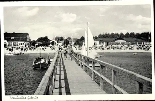 Ak Ostseebad Grömitz in Holstein, Blick vom Steg zum Strand