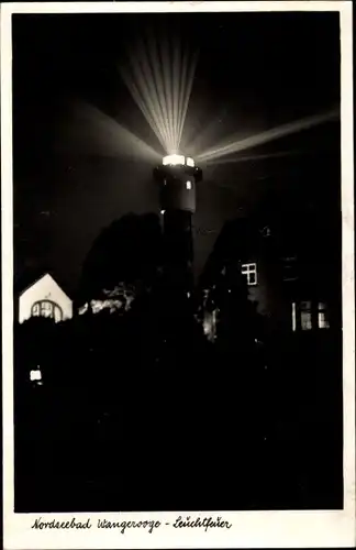 Ak Nordseebad Wangerooge in Ostfriesland, Leuchtturm bei Nacht