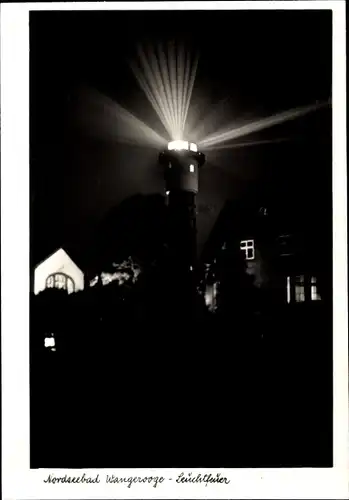 Ak Nordseebad Wangerooge in Ostfriesland, Leuchtturm bei Nacht