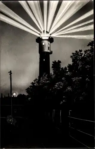 Ak Nordseebad Wangerooge in Ostfriesland, Leuchtturm bei Nacht