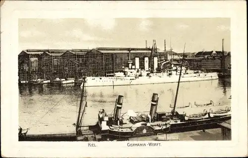 Ak Kiel Schleswig Holstein, Blick zur Germania Werft, Kriegsschiff