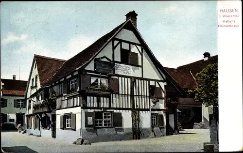 Ak Hausen im Wiesental, Straßenpartie mit Blick auf Hebels Heimathaus, Fachwerkhaus