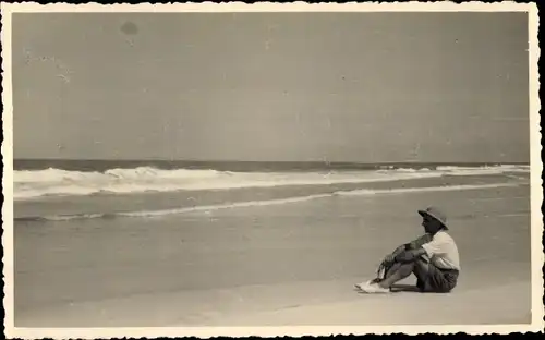 Foto Guinea?, Mann am Strand, Ufer, Wellen