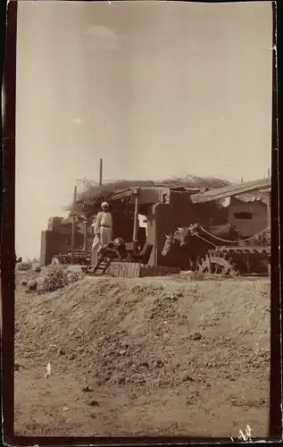 Foto Ägypten? Brunnenanlage, Rinder bewegen Zahnräder