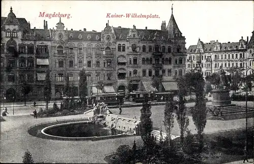 Ak Magdeburg, Kaiser Wilhelm Platz, Straßenbahnen, Denkmal
