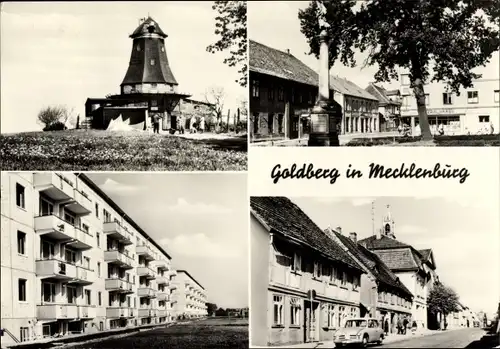 Ak Goldberg in Mecklenburg, Straßenpartie, Mühle, Denkmal, Wohnblöcke