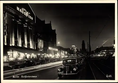 Foto Ak Berlin Charlottenburg, Kurfürstendamm, Haus Wien, Nachtbeleuchtung, Autos