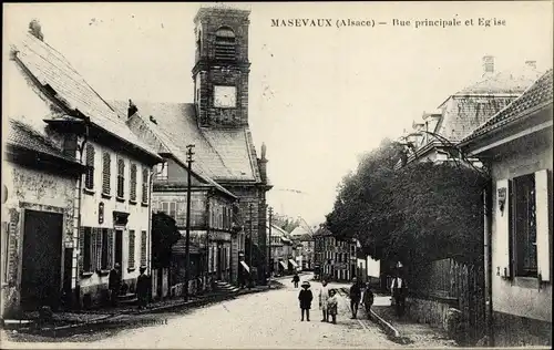 Ak Masevaux Masmünster Elsaß Haut Rhin, Rue principale et Eglise