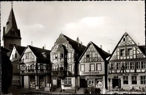 Ak Idstein im Rheingau Taunus Kreis Hessen, Fachwerkhäuser, Lebensmittelhaus, Hotel zum Löwen