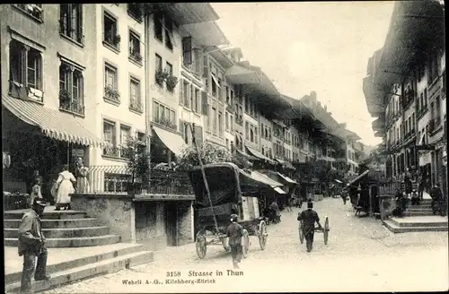 Ak Thun Kanton Bern Schweiz, Straßenpartie