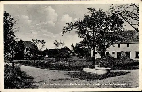Ak Königsbrück in der Oberlausitz, Truppenübungsplatz, Verlassenes Dorf Quosdorf, Wegpartie, Brunnen
