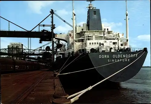 Ak Nordenham in Oldenburg Niedersachsen, Hafen, Midgard Pier, Frachtschiff Dora Oldendorff