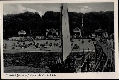 Ak Ostseebad Göhren auf Rügen, Partie an der Seebrücke, Segelboot