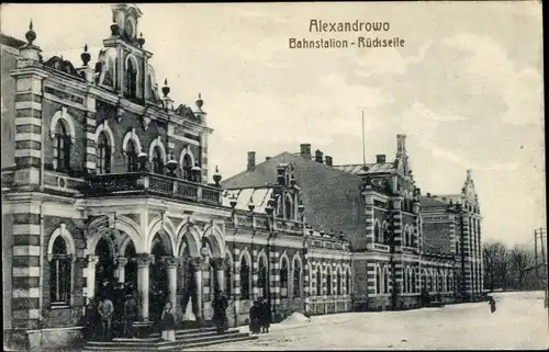 Ak Aleksandrowo Orzysz Alexandrowo Ostpreußen ?, Bahnstation, Rückseite, Bahnhof