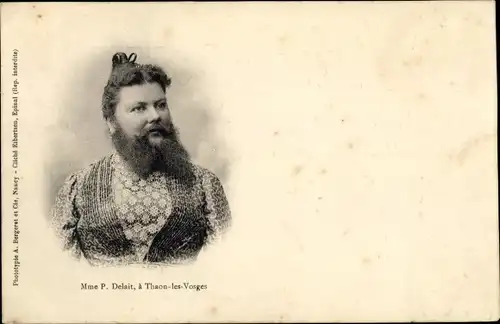 Ak Thaon les Vosges, Madame P. Delait, Frau mit Bart