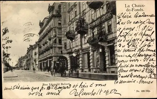 Ak La Chaux de Fonds Kt. Neuenburg Schweiz, Rue Leopold Robert, Straßenblick, Grand Hotel Central