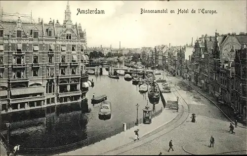 Ak Amsterdam Nordholland Niederlande, Binnenamstel en Hotel de l'Europe