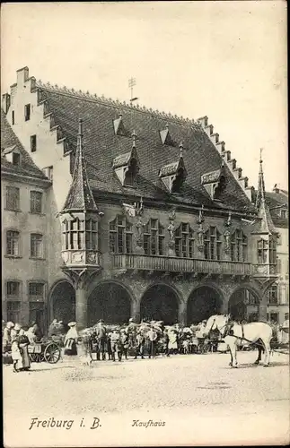 Ak Freiburg im Breisgau, Kaufhaus, Straßenpartie, Pferd