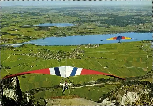 Ak Schwangau im Ostallgäu, Drachenflieger am Tegelberg, Fliegeraufnahme