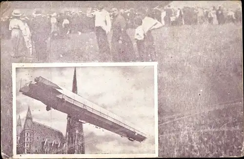 Ak Zeppelin Luftschiff, Teilansicht, Schaulustige am Boden, Luftschiff passiert Kirchturm