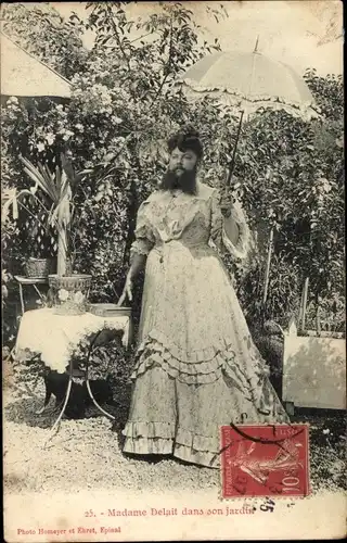 Ak Thaon les Vosges, Madame Delait dans son jardin, Frau mit Vollbart, Portrait