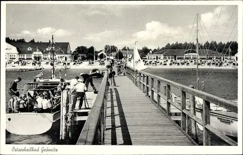Ak Ostseebad Grömitz in Holstein, Landungsbrücke, Strand, Promenande