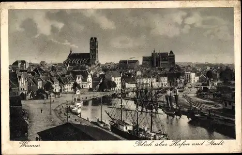 Ak Hansestadt Wismar, Blick über Hafen und Stadt