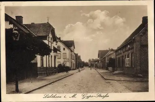 Ak Lübtheen in Mecklenburg, Blick in die Gypsstraße, Geschäftshaus, Wohnhäuser