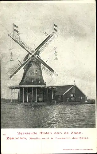 Ak Zaandam Zaanstad Nordholland, Versierde Molen aan de Zaan