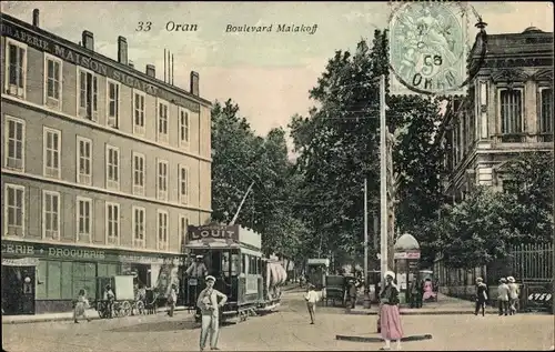 Ak Oran Algerien, Boulevard Malakoff, Tram, Litfaßsäule, Drogerie