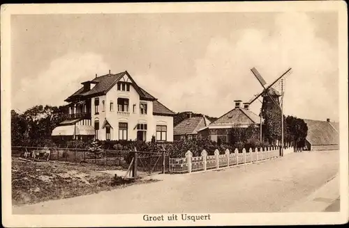 Ak Usquert Groningen, Straßenpartie mit Windmühle