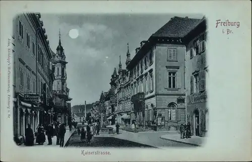 Mondschein Ak Freiburg im Breisgau, Kaiserstraße, Handlung J. Wiessner