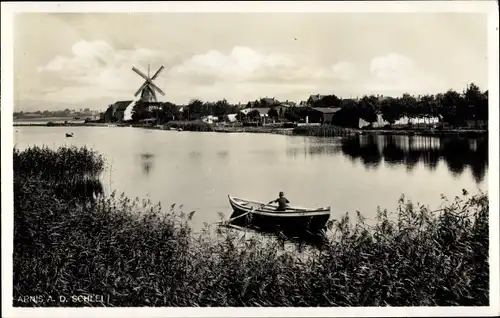 Ak Bad Arnis an der Schlei, Ruderboot, Blick auf den Ort, Windmühle