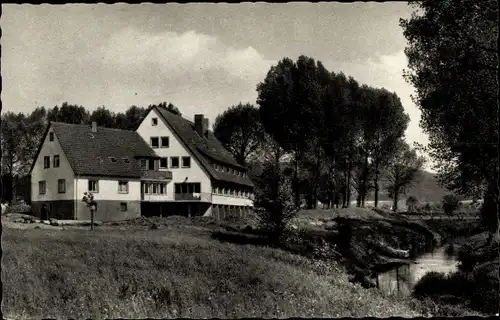 Ak Rinteln a.d. Weser, Blick auf Jugendherberge und Bach