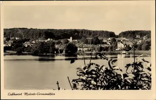 Ak Gremsmühlen Malente in Ostholstein, Blick übers Wasser zum Ort