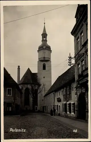 Ak Pulsnitz in Sachsen, Kirche, Straßenpartie