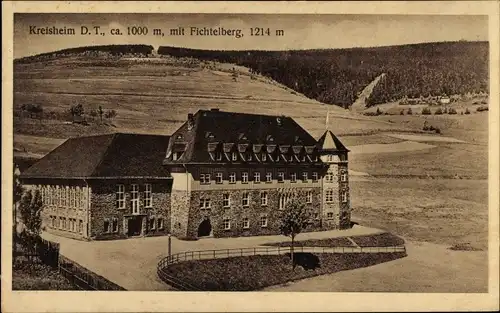 Ak Oberwiesenthal im Erzgebirge, Kreisheim DT mit Fichtelberg