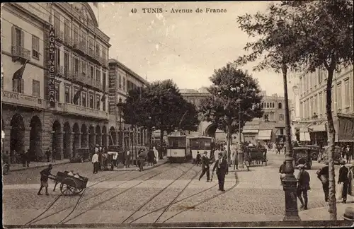 Ak Tunis Tunesien, avenue de France, Straßenbahnen, Einkaufsstraße, Menschen