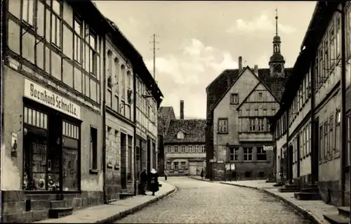 Ak Kelbra am Kyffhäuser, Straßenpartie Marktstraße, Fachwerkhäuser, Geschäft Bernhard Schnelle