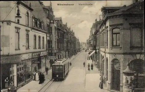 Ak Wilhelmshaven in Niedersachsen, Marktstraße, Straßenbahn, Litfaßsäule