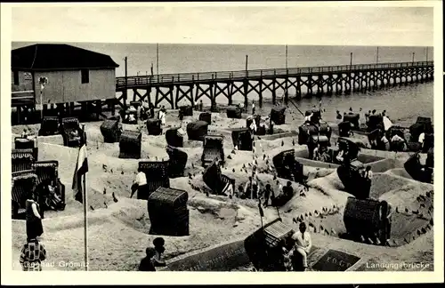 Ak Ostseebad Grömitz in Holstein, Strand, Landungsbrücke