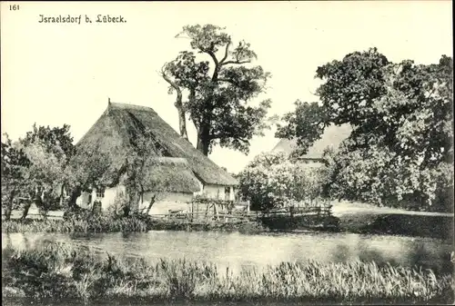 Ak Israelsdorf Lübeck in Schleswig Holstein, Reetdachhaus am See