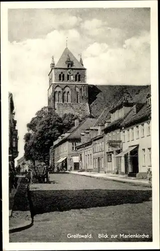 Ak Hansestadt Greifswald, Straßenpartie, Blick zur Marienkirche