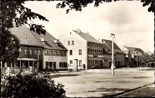 Ak Doberlug Kirchhain in Brandenburg, Hauptstraße, Geschäfte, Litfaßsäule