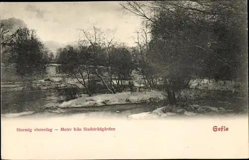 Ak Gävle Schweden, Stormig vinterdag, Motiv fran Stadtsträdgarden