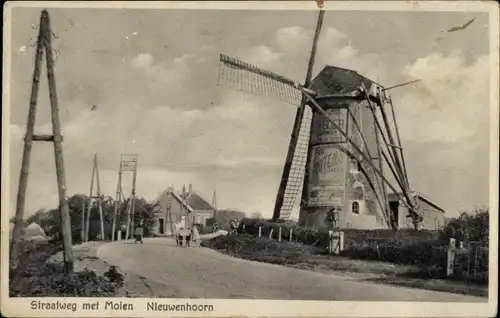 Ak Nieuwenhoorn Südholland Niederlande, Straßenpartie mit Windmühle