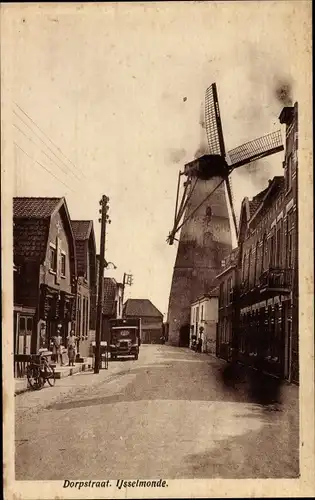 Ak IJsselmonde Rotterdam Südholland Niederlande, Dorfstraße mit Windmühle