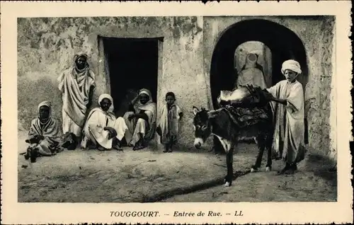 Ak Touggourt Algerien, Entrée de Rue, Esel, Männer